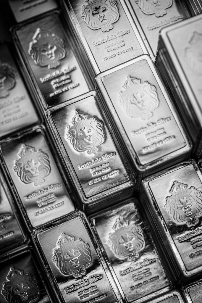 Scottsdalemint.com Pile of Silver stacker bars by Scottsdale Mint on a dark background. 🇺🇸 Minting Gold/Silver in AZ, Legal Tender for 20+ Countries Creator of Silver Stacker® Bars . We are a US private mint based in Scottsdale Arizona. We design, manufacture and deliver the best silver and gold coins and bars on the market for both consumers, banks and governments around the world. Please give us a mention!