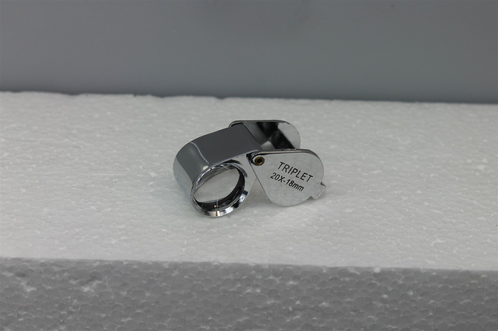 57 1180.jpg 10X Triplet Jewelers Loupe 21mm Chrome Round Body – Professional Gem and Diamond Magnifier with Pouch