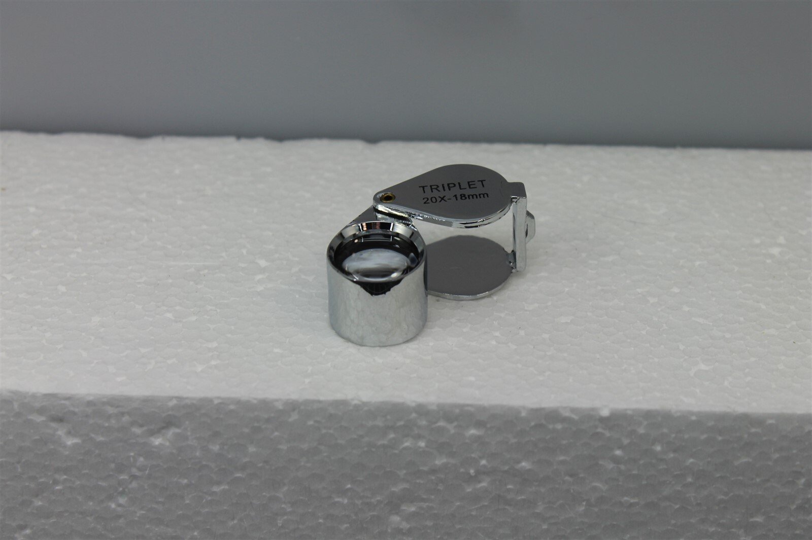 57 1187.jpg 10X Triplet Jewelers Loupe 21mm Chrome Round Body – Professional Gem and Diamond Magnifier with Pouch