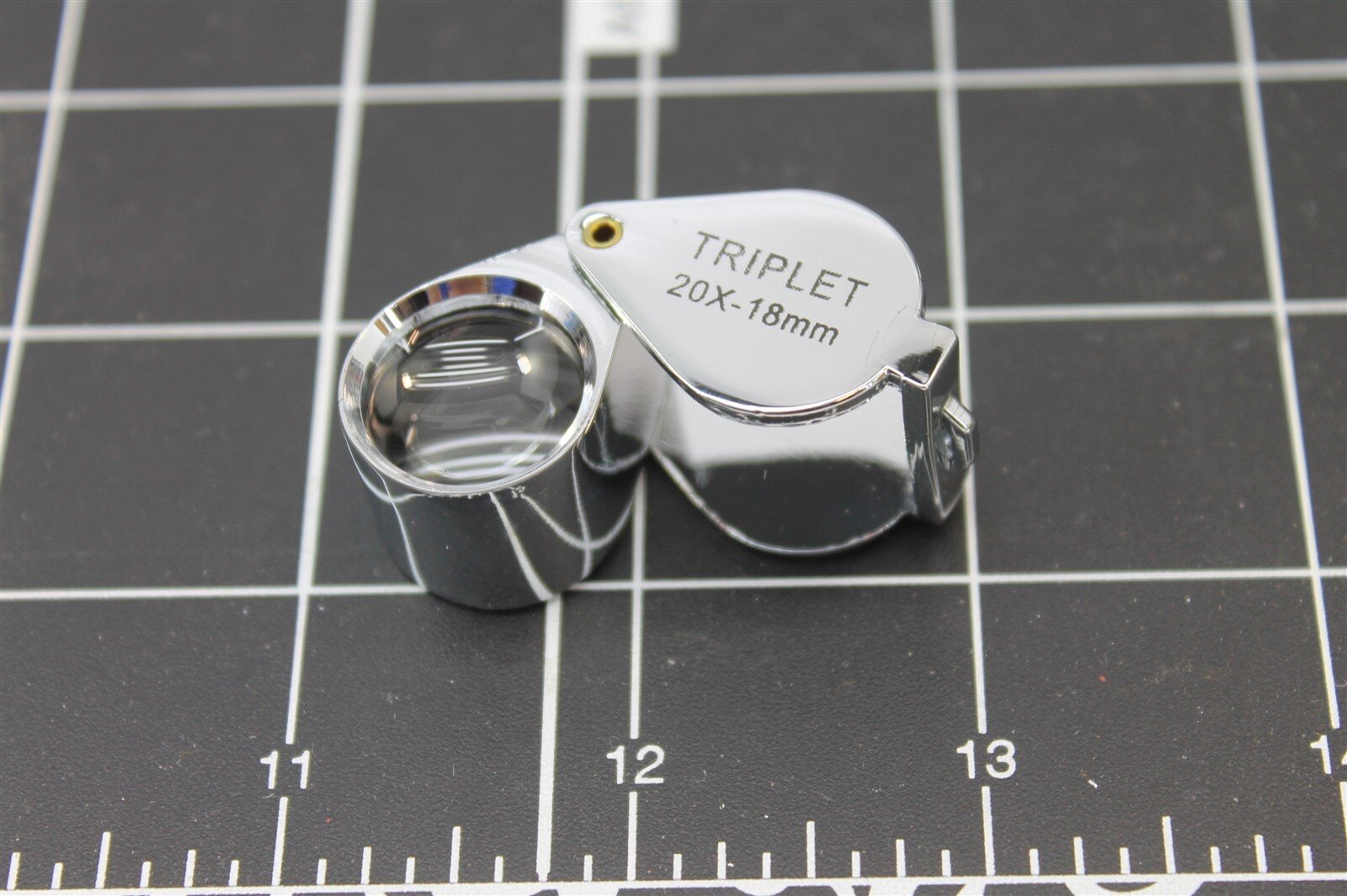 57 1193.jpg 10X Triplet Jewelers Loupe 21mm Chrome Round Body – Professional Gem and Diamond Magnifier with Pouch