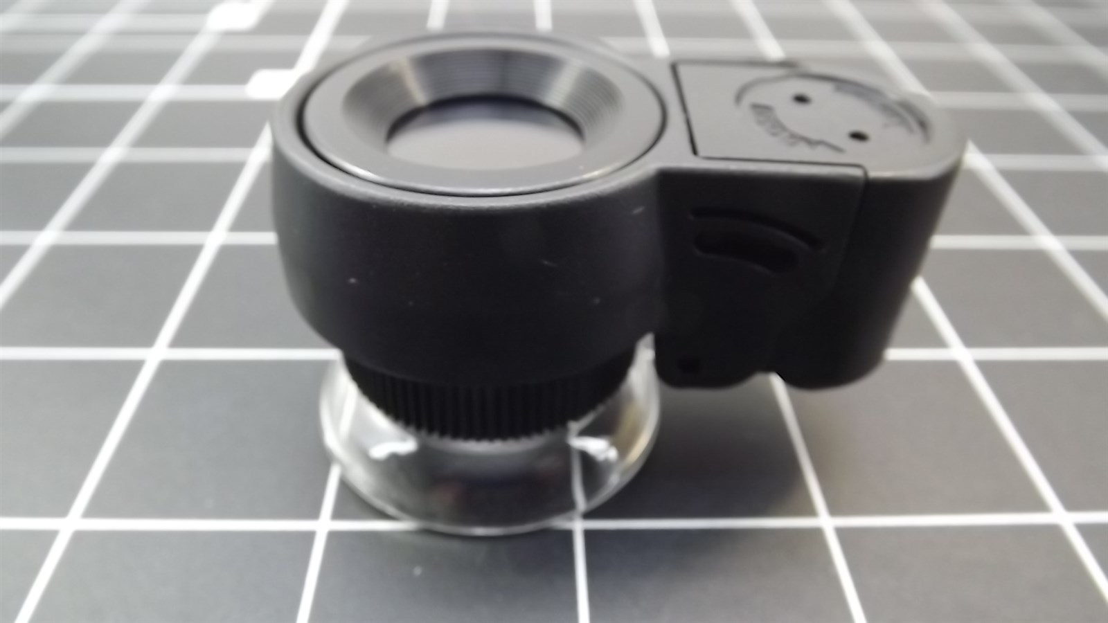 57 1218.jpg 15X 21mm UV and LED Stamp Loupe – Lighted Glass Lens Magnifier with 382–385nm UV for Stamps and Gems