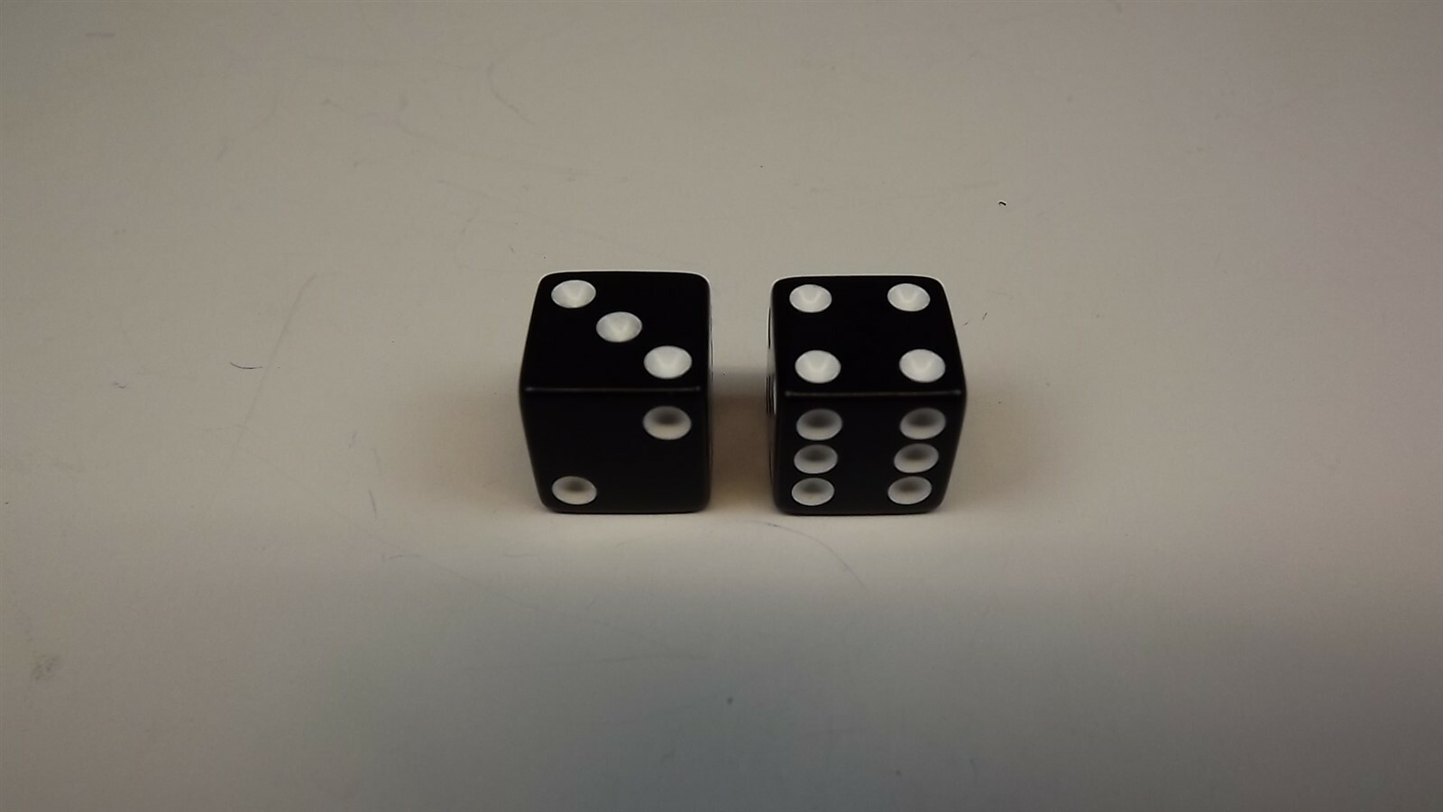 57 2008.jpg Black and White Dice Valve Stem Caps 2-Piece Set – Rat Rod, Car, Truck and SUV Tire Valve Caps