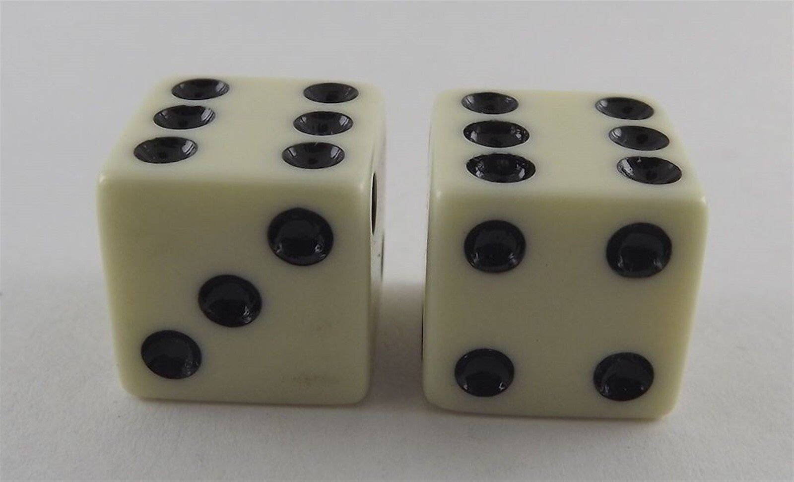 57 2089.jpg Ivory Dice Valve Caps 2-Piece Set – Old School BMX Schrader Caps Fit SE, GT, Hutch and Redline Bikes