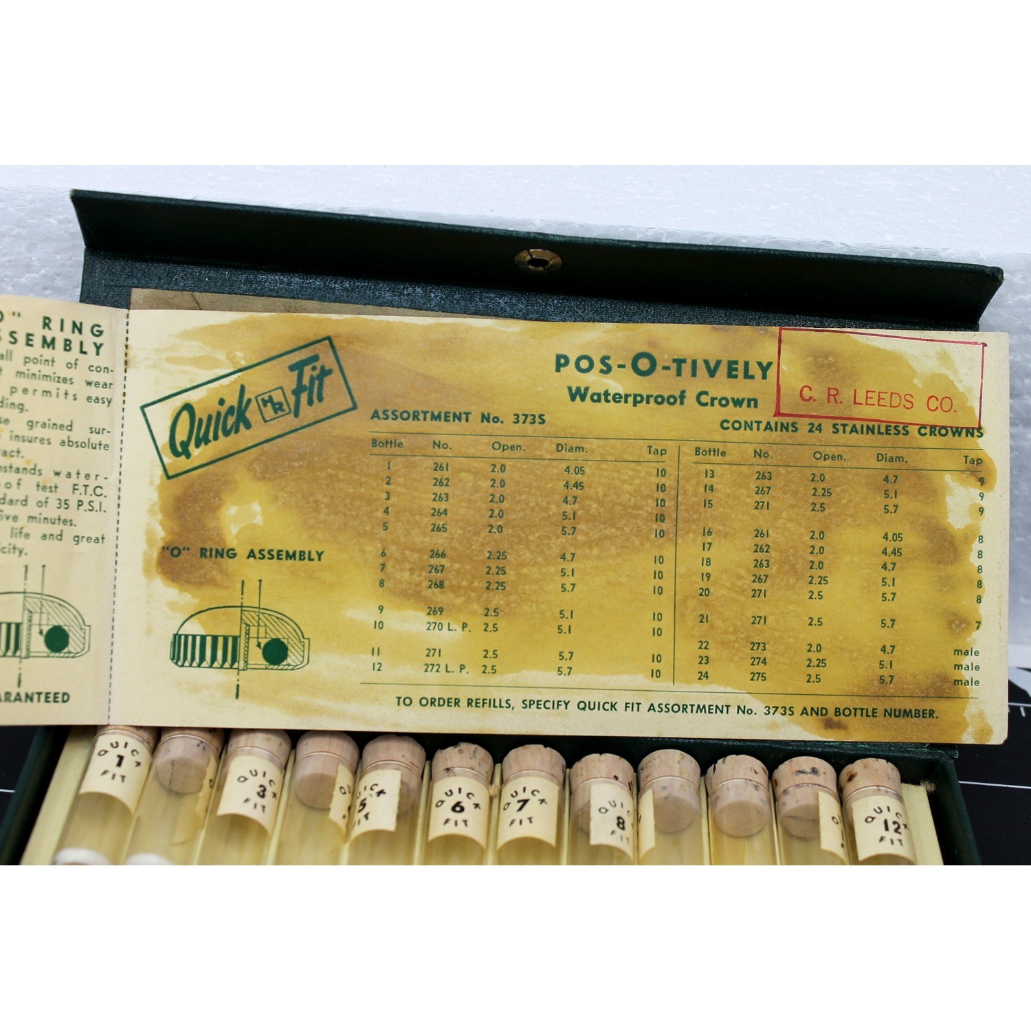 57 2237.jpg Vintage Quick Fit No. 373S Waterproof Watch Crown Assortment – 24 Vials, C.R. Leeds Watchmaker Case