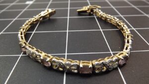 Gold Tone Purple Stone Tennis Bracelet 8″ – Marked 925 Line Bracelet with Purple Stones, 14.1 Grams