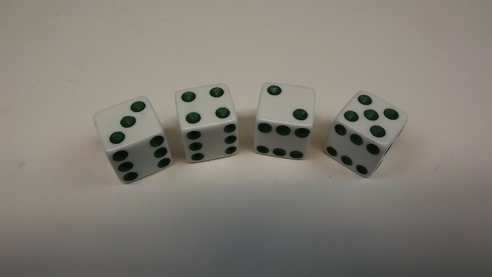 57 2506.jpg White and Green Dice Valve Stem Caps 4-Piece Set – Rat Rod, Car, Truck, SUV and BMX Tire Stem Caps