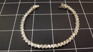 Roman Silver Tone Clear Round Stone Tennis Bracelet 7.5″ – Roman Signed Clasp Line Bracelet