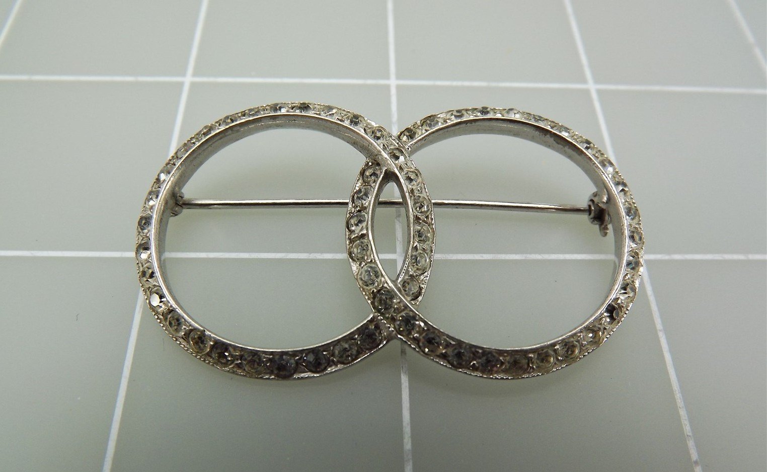 57 330.jpg Vintage 925 Sterling Silver Entwined Circle Brooch with 58 Clear Stones – 7.1 Grams, Estate Jewelry Pin
