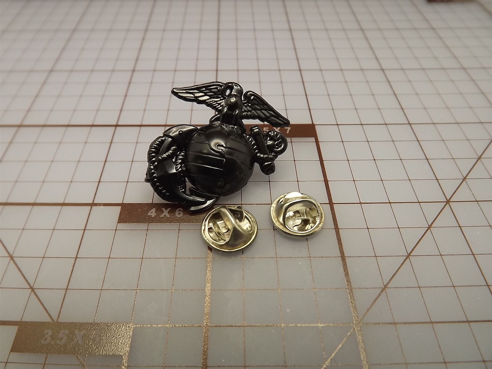 usmc-ega-lapel-pin-black-left-4 USMC Eagle, Globe & Anchor Lapel Pin, Left Side – Subdued Black Marine Corps Hat, Jacket or Bag Pin – view 4