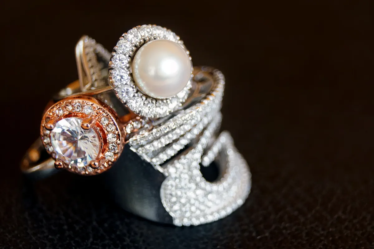 Estate rings and an emerald and diamond pendant from PACPAWN