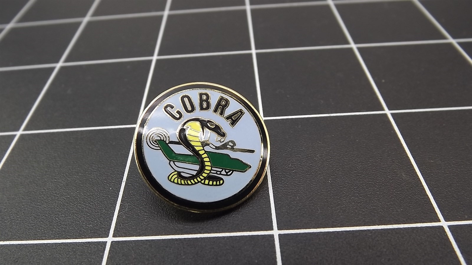 s l1600 1389.jpg AH-1G Cobra Helicopter Round Lapel Pin – Enamel Coiled Snake Army Aviation Hat Pin