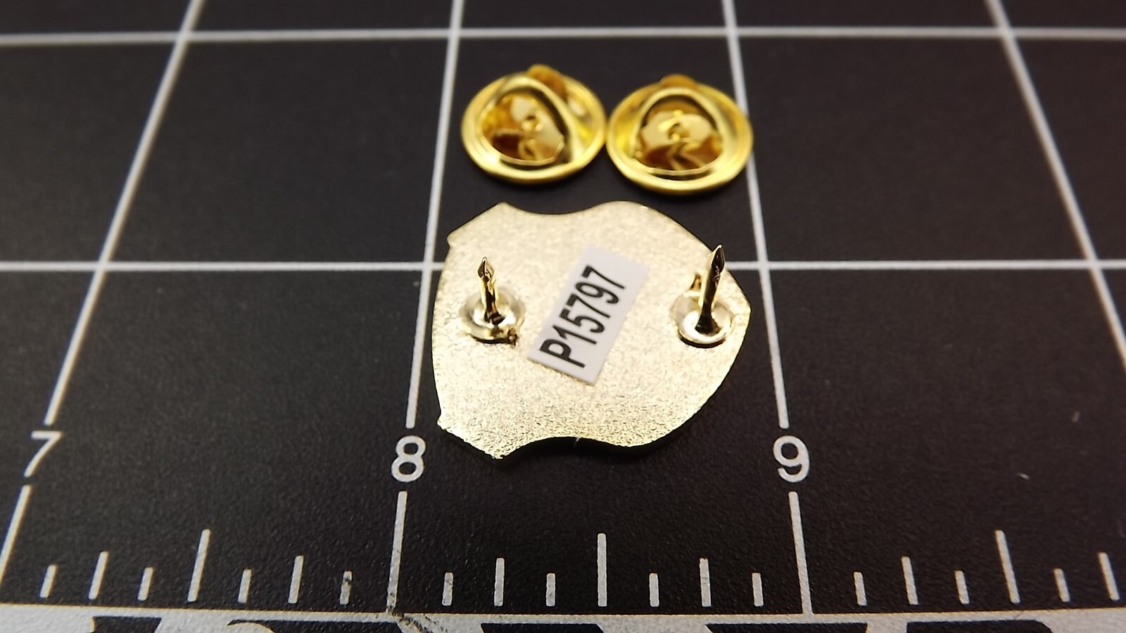 s l1600 1469.jpg USMC 9th Marine Regiment Lapel Pin – 1" Red Enamel Shield with "9" & Lightning Bolt Unit Hat Pin – view 2