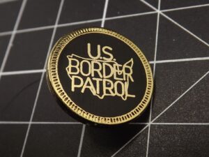 U.S. Border Patrol Lapel Pin – 3/4" Black & gold enamel