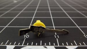 Shotgun Lapel Pin – Black & gold-tone