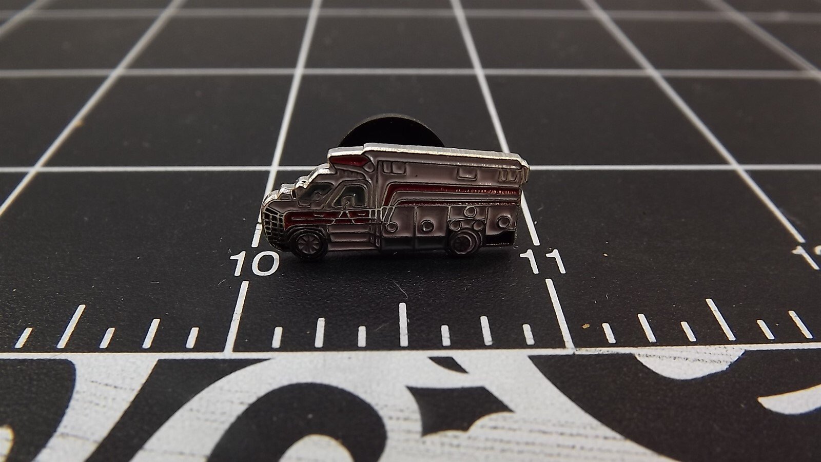 s l1600 2219.jpg Ambulance Lapel Pin – Silver-tone