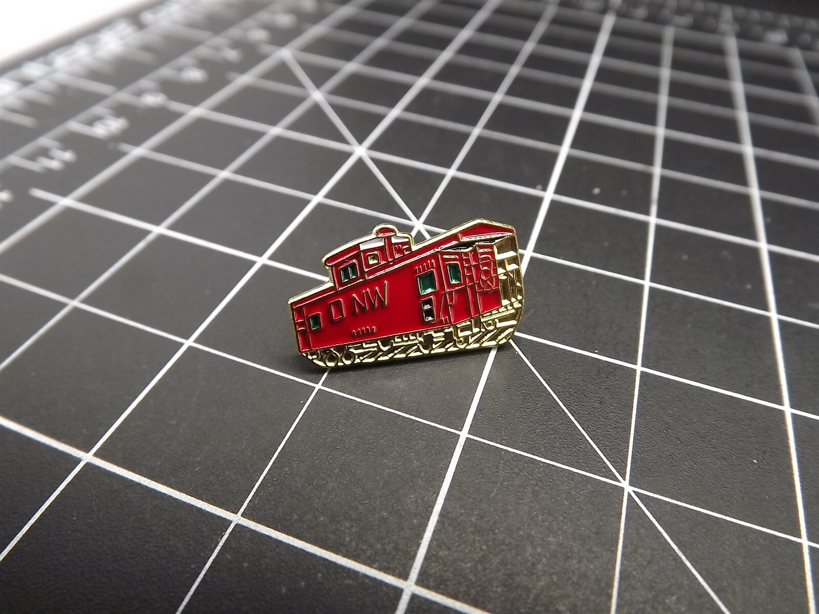 s l1600 2490.jpg Caboose Lapel Pin – Red enamel