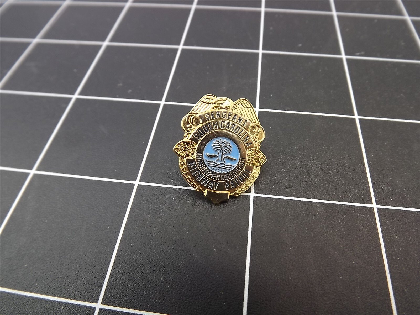 s l1600 2632.jpg South Carolina Highway Patrol Sergeant Badge Lapel Pin – Gold-tone