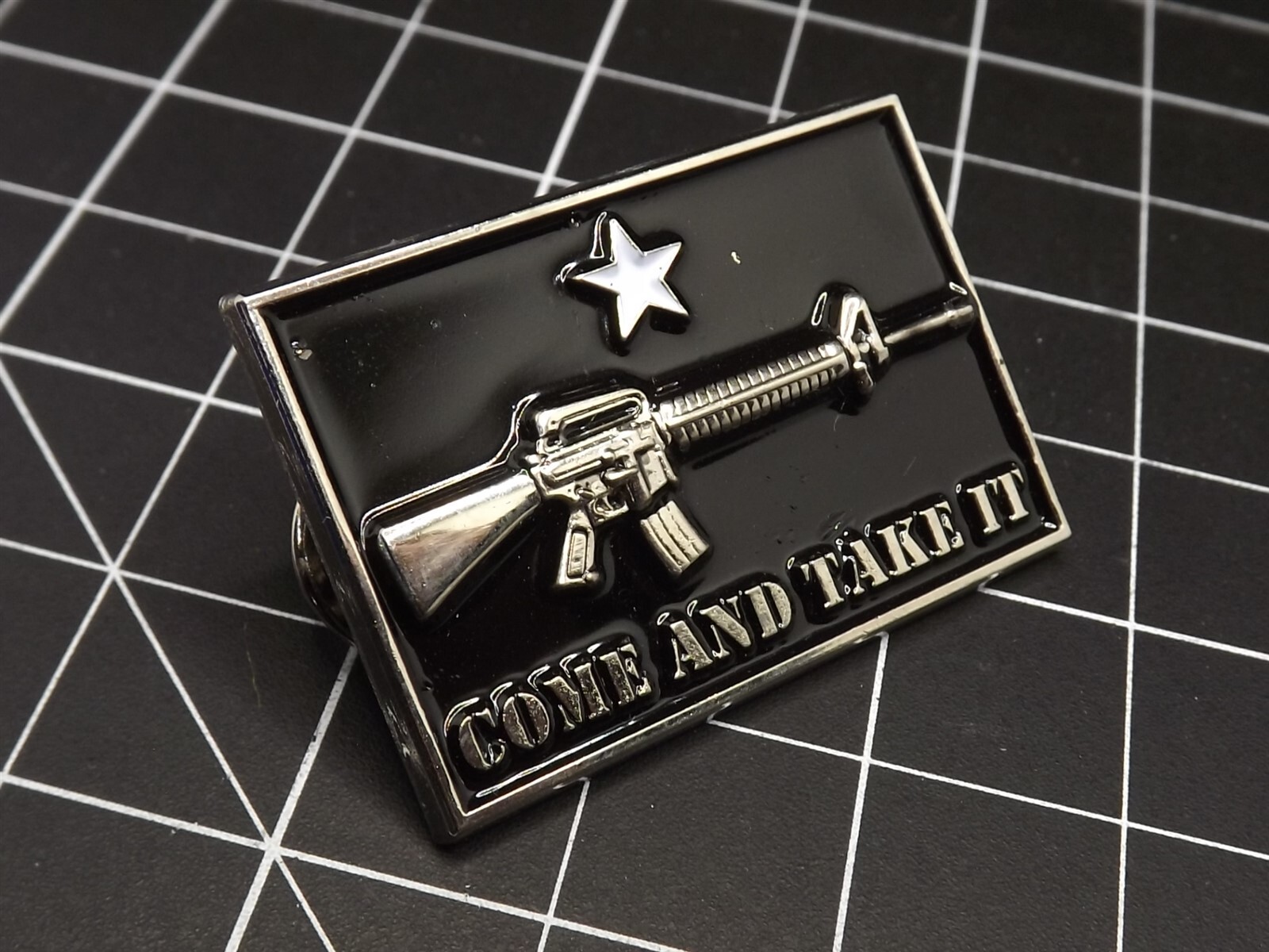s l1600 3148.jpg "Come And Take It" M-16 Rifle Lapel Pin – 1-1/2" wide Black enamel