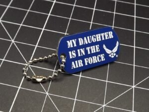 "My Daughter Is In The Air Force" Dog Tag Lapel Pin – Blue & white enamel with chain