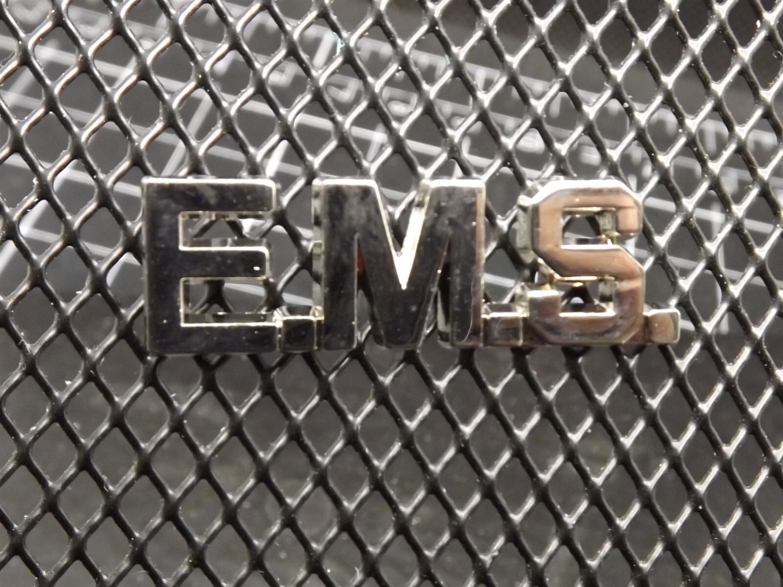 s l1600 5215.jpg "E.M.S." Letters Lapel Pin – Silver Tone